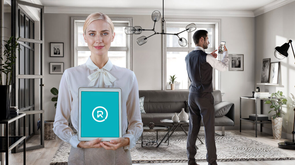 Woman showing tablet with logo of realitiq